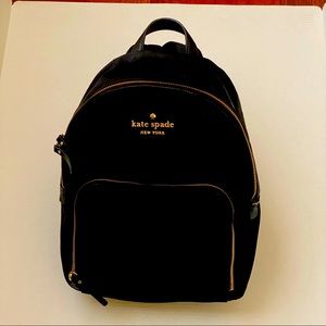 Kate Spade New York Black Nylon Backpack with Gold and leather accents.